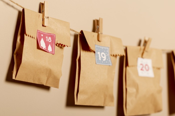 paper style pouches hanged with hooks wall