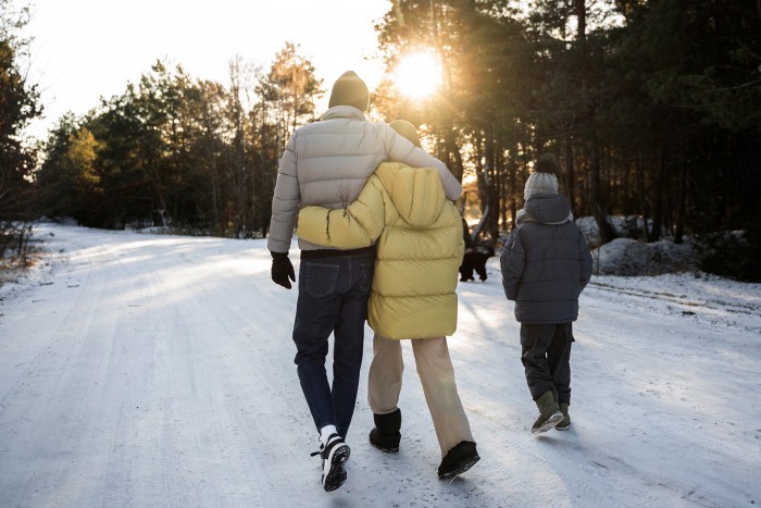 family walking together nature